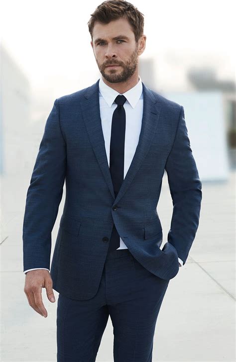 navy suit with blue tie